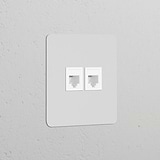 Single 2x RJ45 Module in paintable white for wall installation, designed for networking connections.