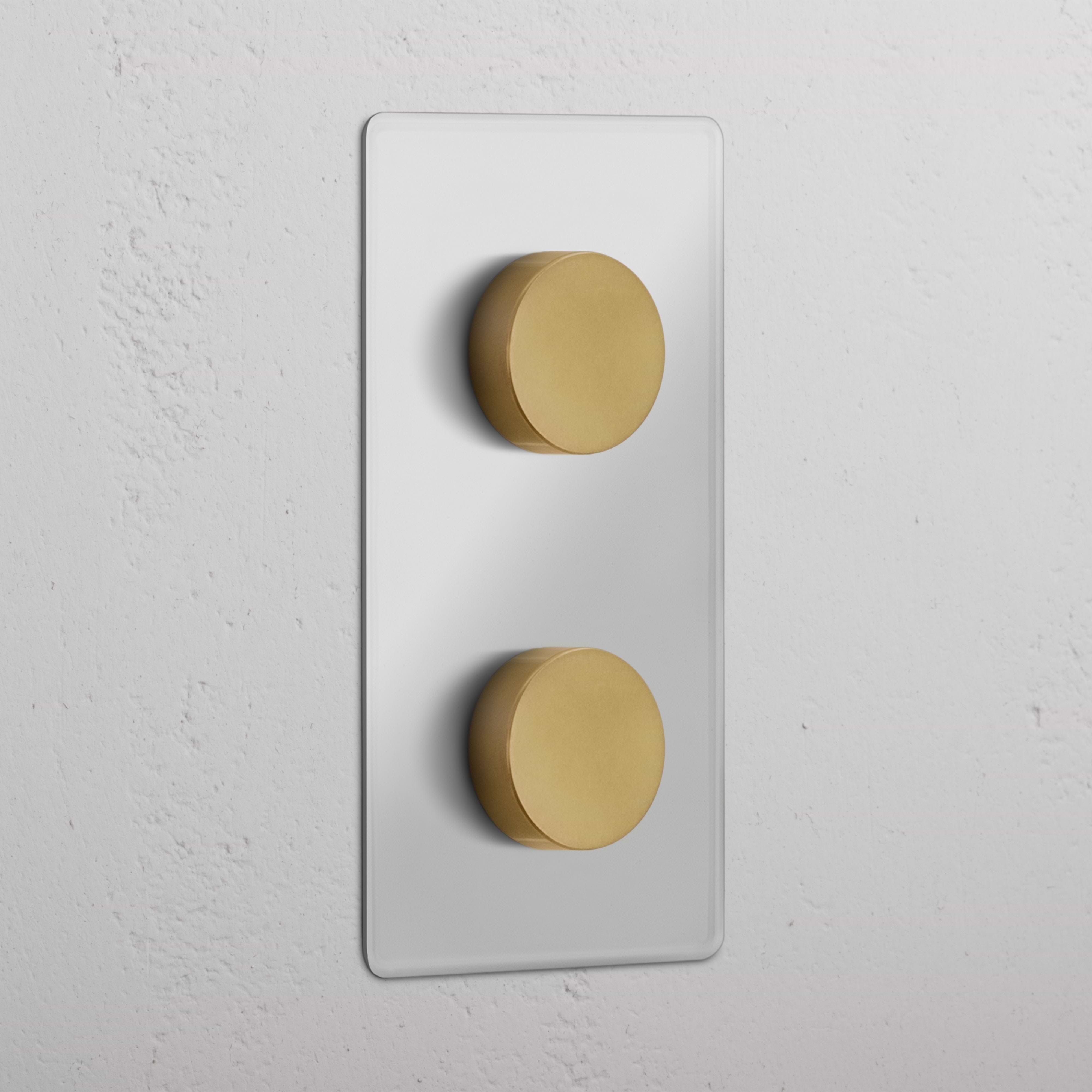 Double 2x Vertical Multiway Dimmer Switch in clear antique brass with two round dials on a white panel.