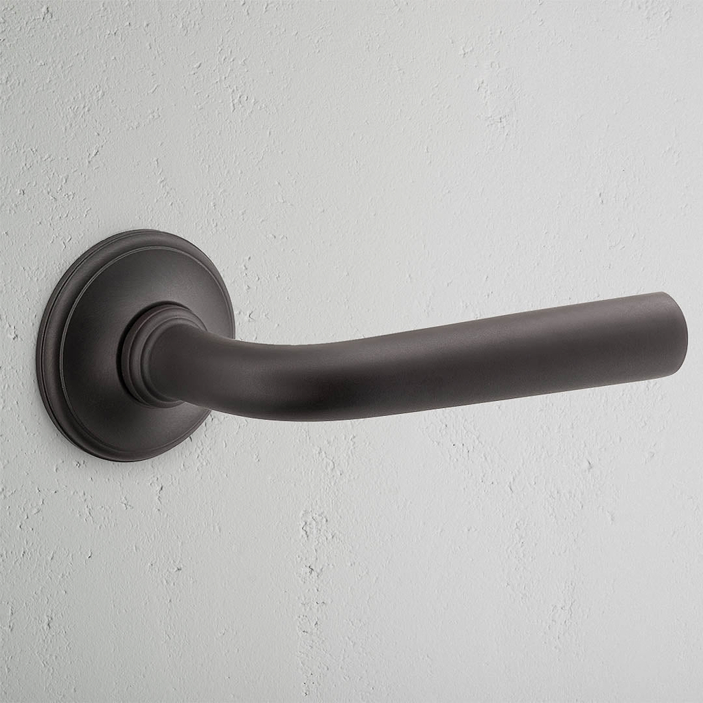 Apsley Unsprung Door Handle Bronze Finish on White Background