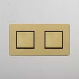 Stylish Double Rocker Switch in Antique Brass Black finish on White Background