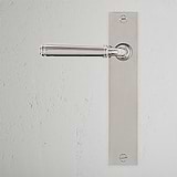Digby Long Plate Sprung Door Handle Polished Nickel Finish on White Background right Facing Front View