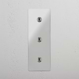 User-Friendly Vertical Triple Toggle Switch in Clear Polished Nickel - Practical Light Control Accessory on White Background