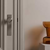 Poplar Long Plate Sprung Door Knob – Polished Nickel