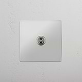 Central Single Toggle Switch in Clear Polished Nickel - Versatile Lighting Solution on White Background