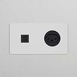 Black paintable module with Swiss Type J power socket and dual 30W USB ports for versatile home or office use.