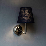 Malvern Medium Wall Light Basalt Grey in Polished Nickel affixed to a neutral coloured wall