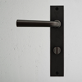 Apsley Long Plate Sprung Door Handle & Thumbturn Bronze Finish on White Background right Facing Front View