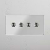 Advanced Four-Levers Double Toggle Switch in Clear Polished Nickel for Light Control on White Background