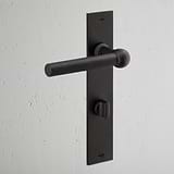 Harper Long Plate Sprung Door Handle & Thumbturn Bronze Finish on White Background at an Angle