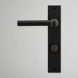 Harper Long Plate Sprung Door Handle & Thumbturn Bronze Finish on White Background right Facing Front View