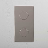 Dual Vertical Light Intensity Control Switch on White Background: Polished Nickel Double 2x Vertical Dimmer Switch