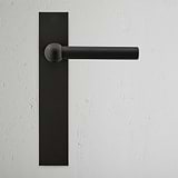 Harper Long Plate Fixed Door Handle Bronze Finish on White Background Front Facing