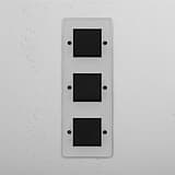 Efficient Vertical Triple Rocker Switch in Clear Bronze Black for Lighting Control on White Background