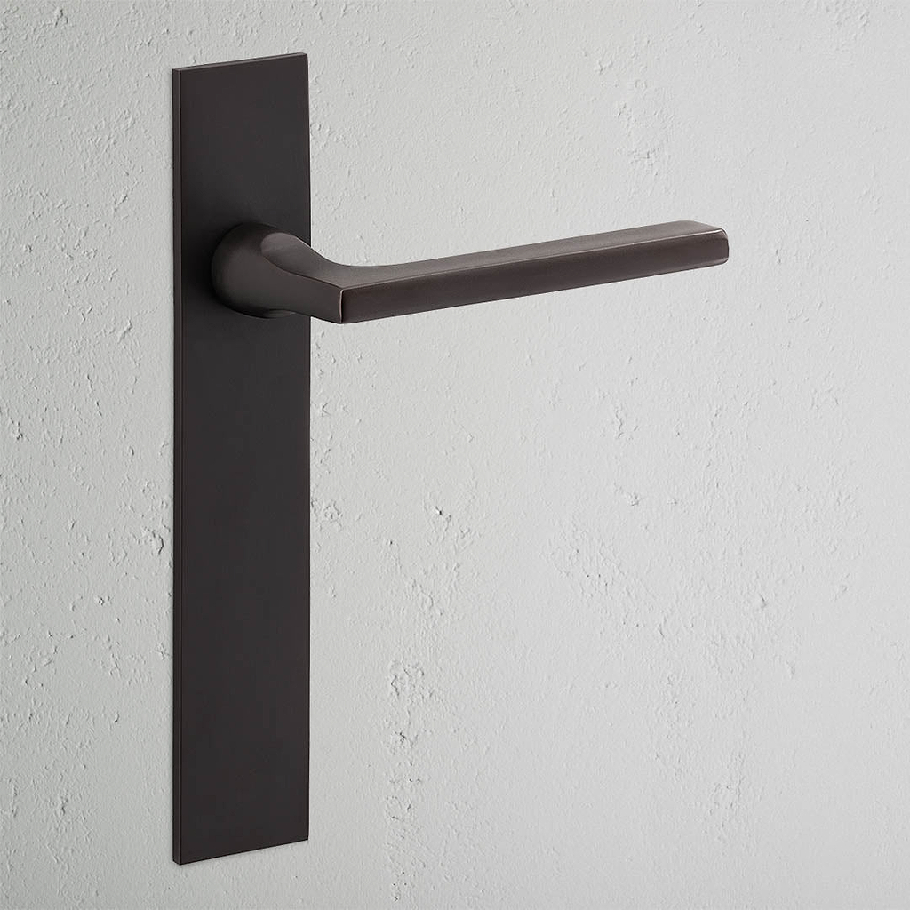 Clayton Long Plate Fixed Door Handle Bronze Finish on White Background