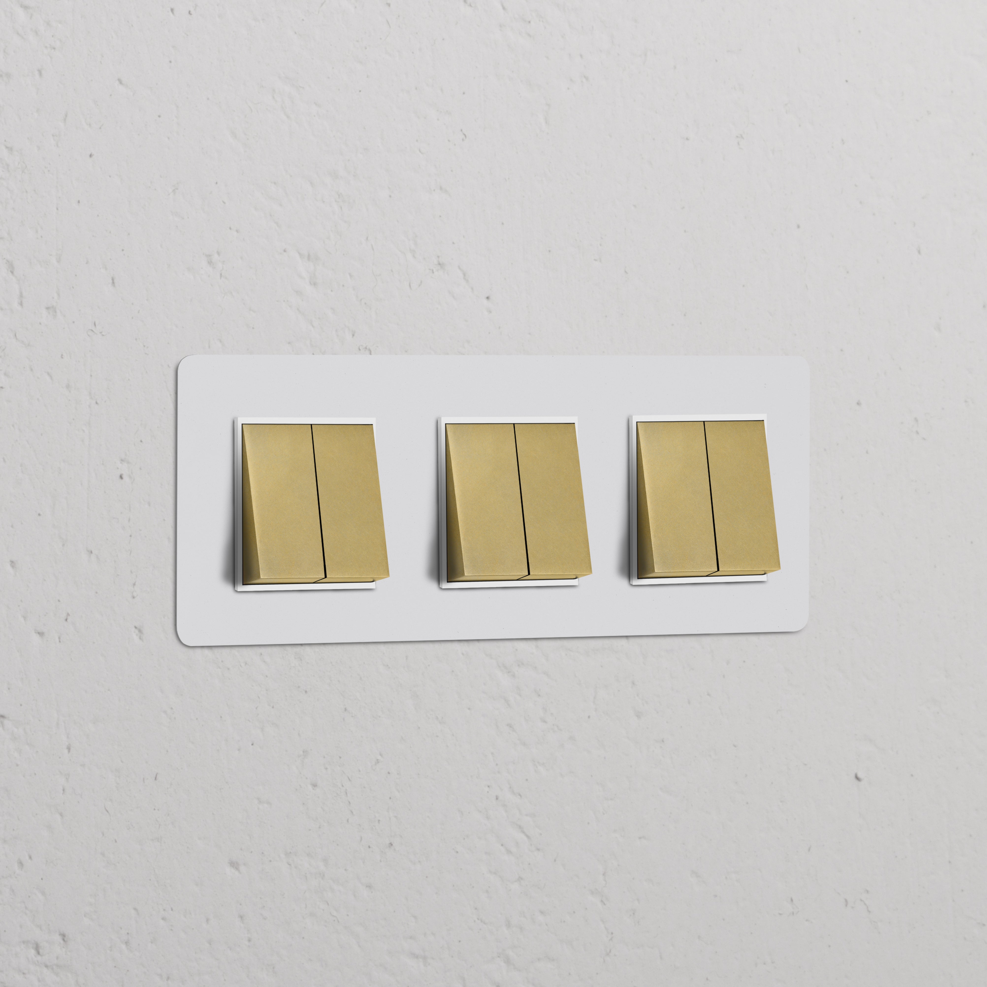 Triple 6x Rocker Switch in paintable antique brass white, featuring three elegant light switches for wall installation.