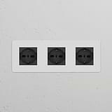 Triple 3x Schuko/Bipasso Power Module in paintable black, featuring three socket outlets.