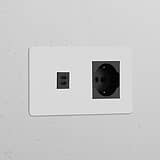 Paintable black module with double USB 30W & Schuko/Bipasso power sockets for versatile European use.