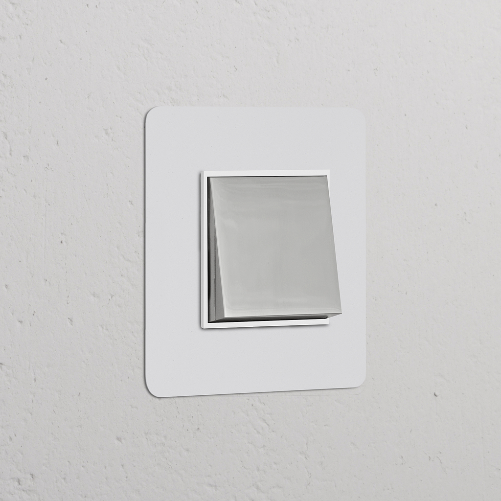 Single rocker switch in paintable polished nickel and white, suitable for switches and dimmers.