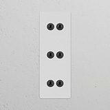 Triple 6x vertical toggle switch in paintable bronze, designed for use with triple vertical switches & dimmers.