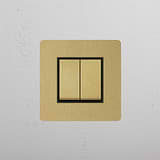 Double Rocker Switch in Antique Brass Black, Single Set on White Background