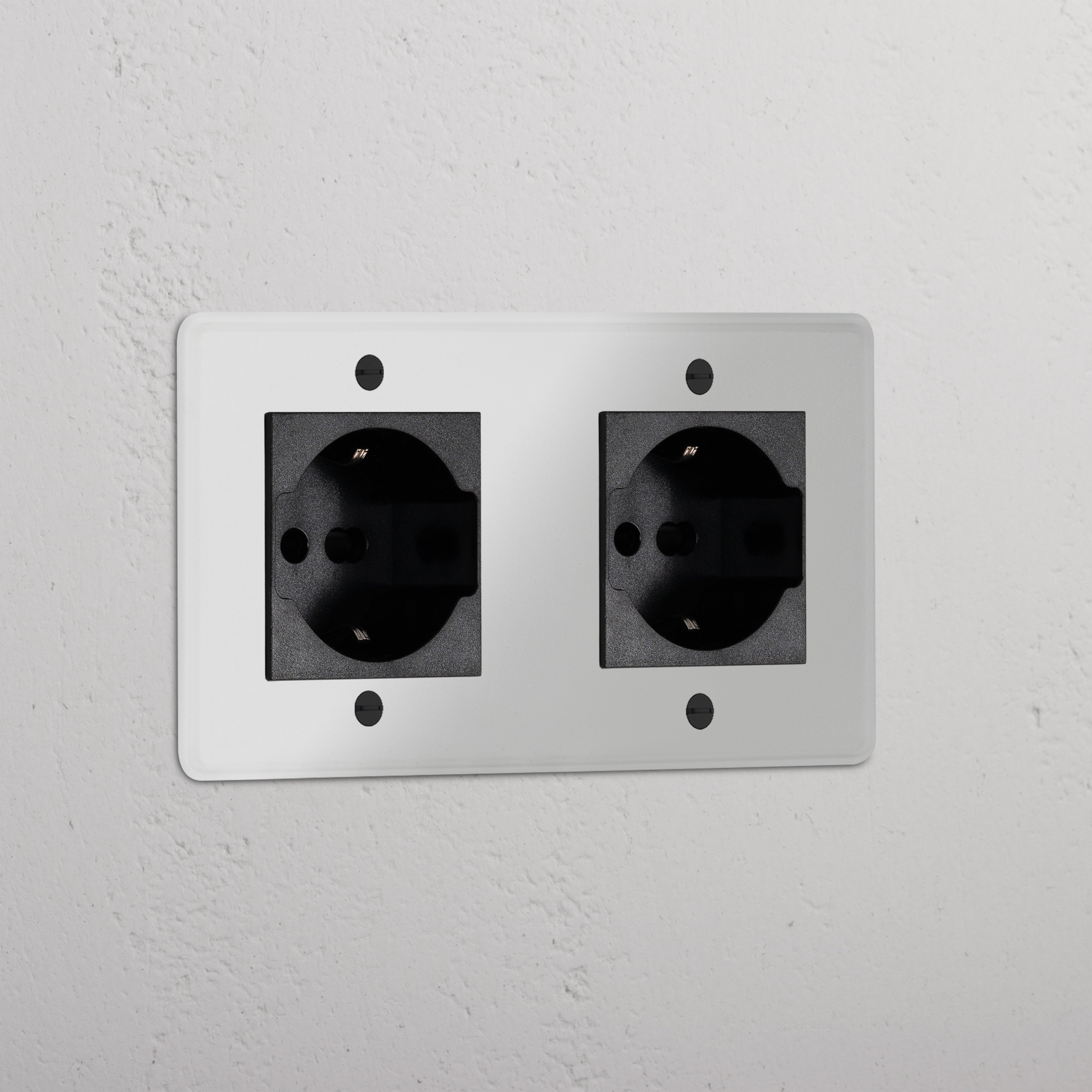 Double 2x Schuko/Bipasso Module in clear black finish; a stylish, functional electrical socket for modern spaces.