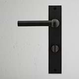 Harper Long Plate Sprung Door Handle & Thumbturn Bronze Finish on White Background right Facing Front View