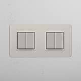 High Capacity Light Control Switch: Polished Nickel White Double 4x Rocker Switch on White Background
