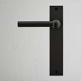 Harper Long Plate Fixed Door Handle Bronze Finish on White Background right Facing Front View