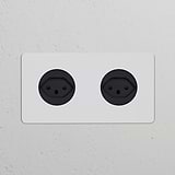 Double 2x Swiss Type J Power Module Round in paintable black for sleek double socket installation.