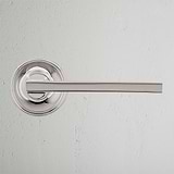 Clayton Sprung Door Handle Polished Nickel Finish on White Background Front Facing