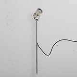 Cambridge Ground Spotlight 24V in polished nickel, a sleek outdoor spotlight with black power cord attached.