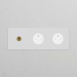 Triple toggle switch with 2x French/Belgian Type E sockets in paintable antique brass white finish.