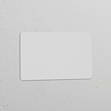 Double Blank Plate in EU Paintable Switch Plates, ready to customize on a textured white surface.