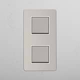 Dual Vertical Light Control Switch: Polished Nickel White Double 2x Vertical Rocker Switch on White Background