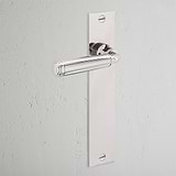 Digby Long Plate Sprung Door Handle Polished Nickel Finish on White Background at an Angle