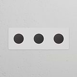 Triple 3x Dimmer Switch in paintable bronze finish on a white panel, suited for efficient lighting control.