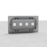 Paintable Double 4x Switch Plate EU with four square cut-outs, ideal for customizable switch configurations.