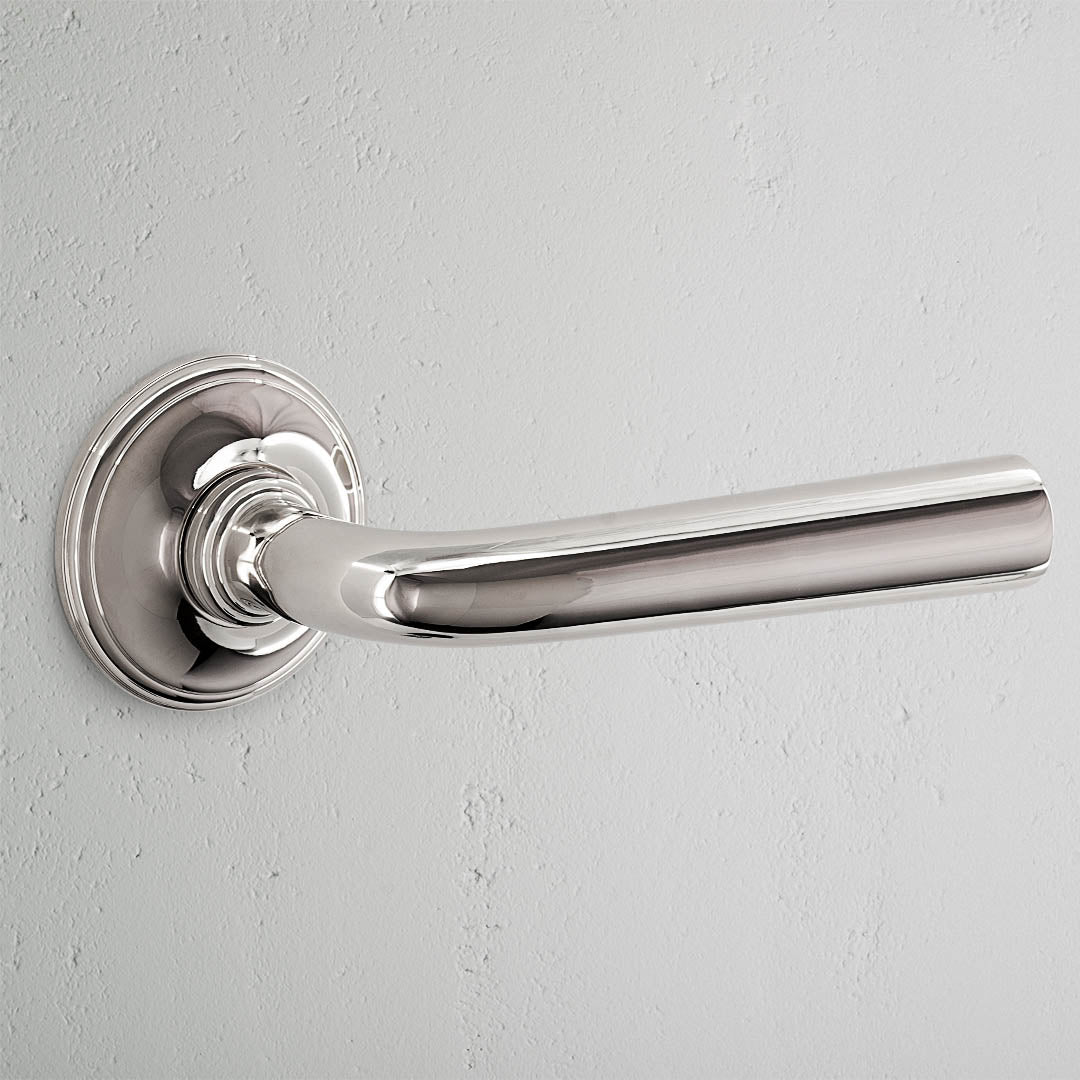 Apsley Sprung Door Handle Polished Nickel Finish on White Background