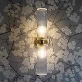 Claremont Medium Wall Light Fluted Glass Antique Brass Finish on White Background right Facing, Front View