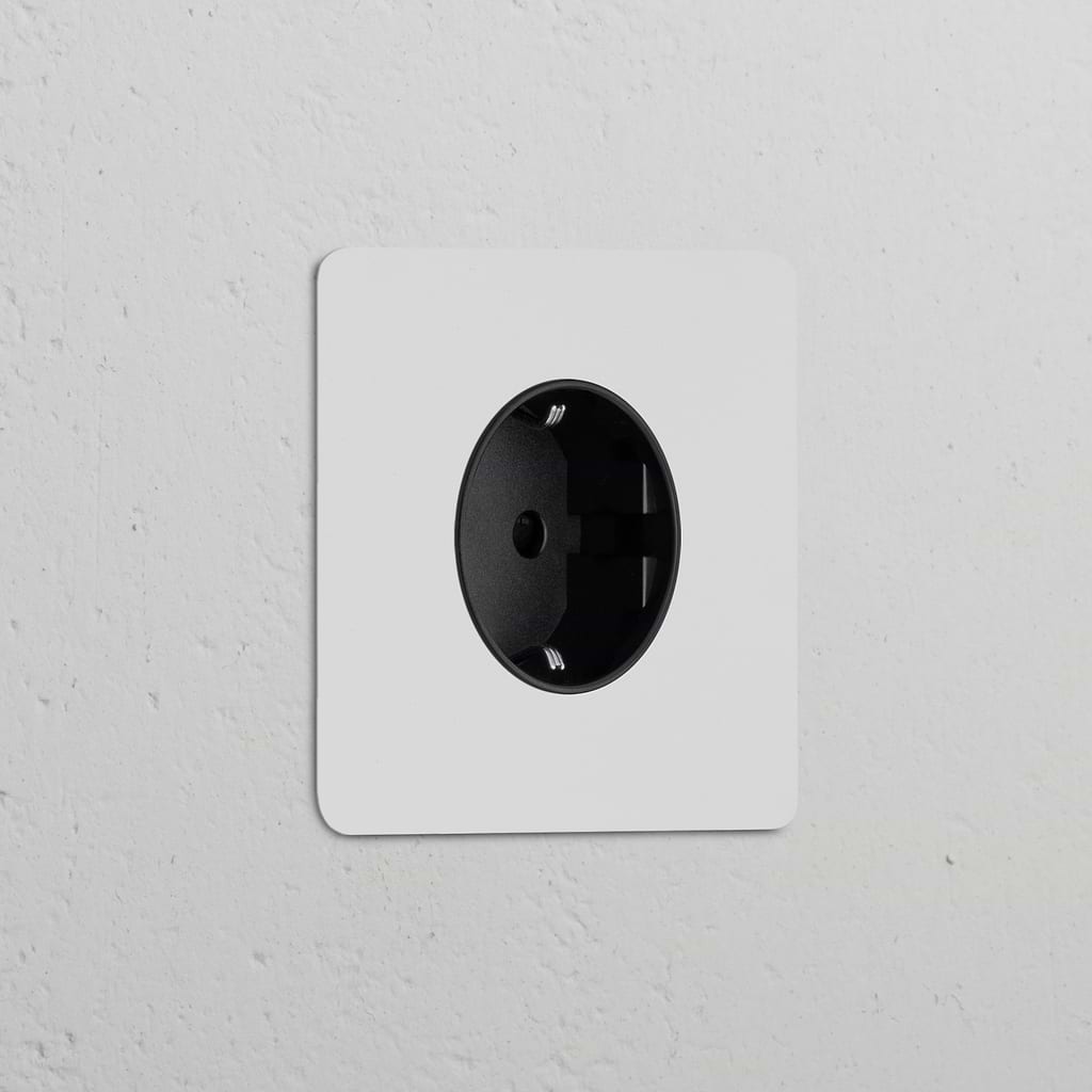Round Schuko Type F power module, paintable black, from Single Sockets & Modules for versatile wall integration.