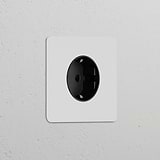 Round Schuko Type F power module, paintable black, from Single Sockets & Modules for versatile wall integration.