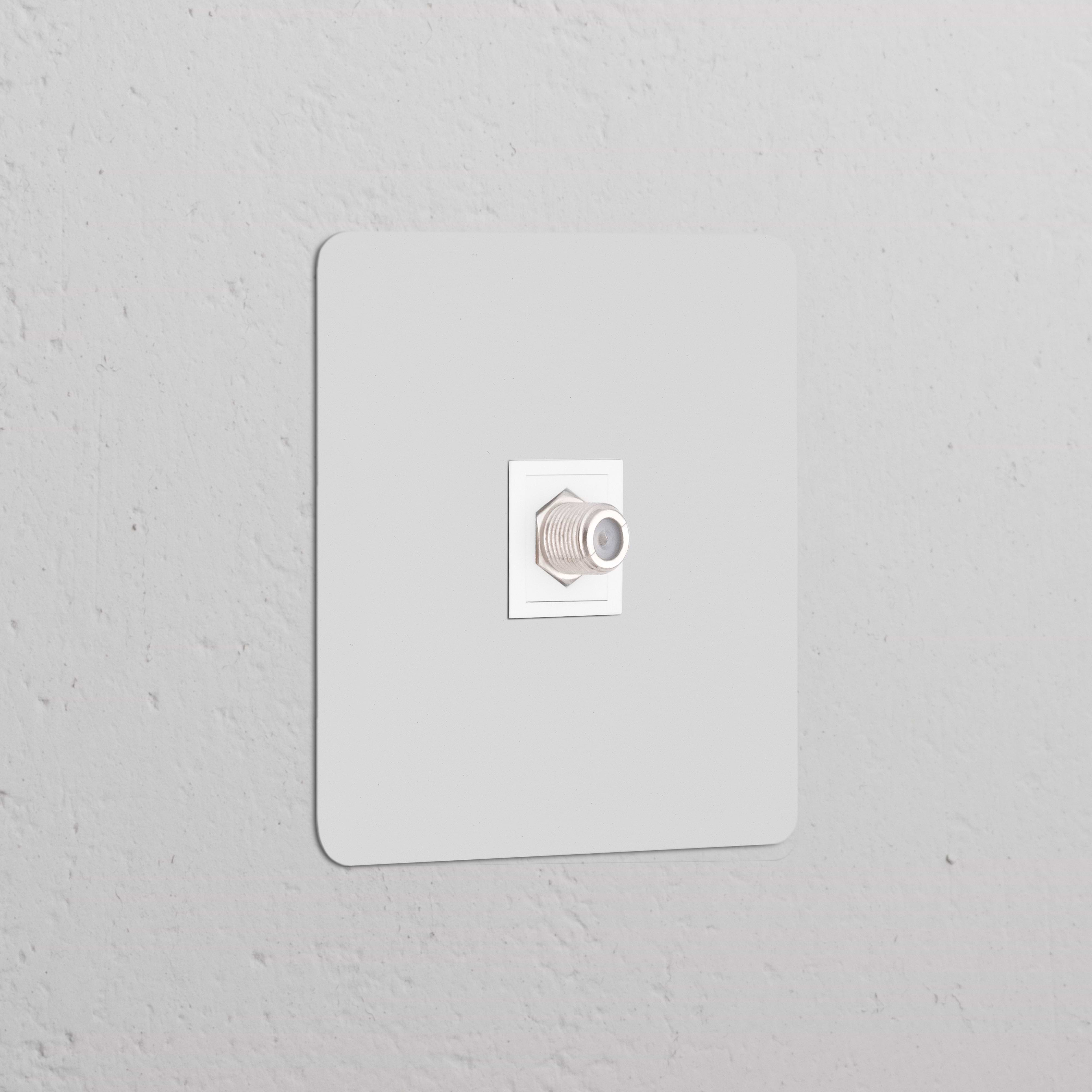 Single Satellite Module paintable white - single socket module, shown on a textured gray wall.