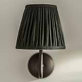 Small Malvern Wall Light in Deep Green front facing close up of pleated shade 