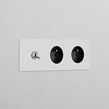 Triple Toggle Switch + 2x Type E Power Modules in polished nickel on a black paintable plate.