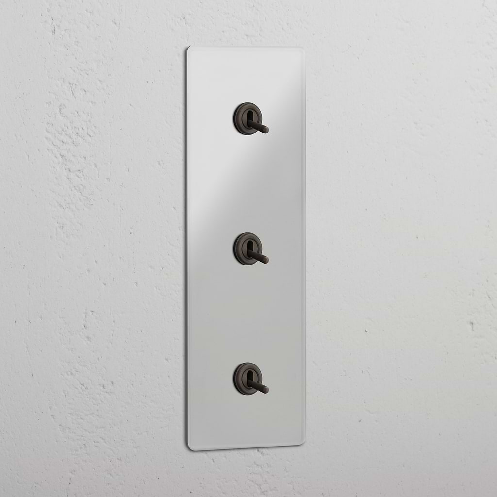 Vertical Triple Toggle Switch in Clear Bronze - User-friendly Light Management System