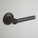 Bronze Harper Fixed Door Handle on White Background