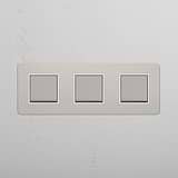 Triple Rocker Switch in Polished Nickel White on White Background