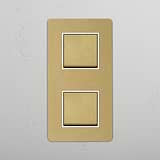 Vertical Double Rocker Switch in Antique Brass White, Two Positions on White Background