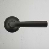 Apsley Sprung Door Handle Bronze Finish on White Background Front Facing
