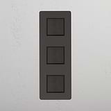 Bronze Black Triple Vertical Rocker Switch - Modern Tool for Light Management on White Background